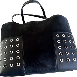 Almost pristine condition Tory Burch Grommet Tote in black 11.5”x15.54”x5.78”